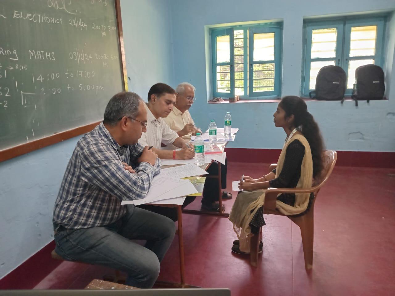 Selection committee interviewing scholarship applicants